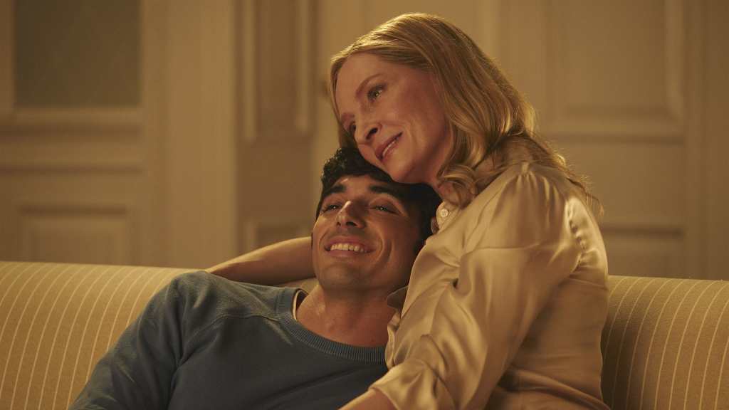 In the Red White and Royal Blue movie, Uma Thurman hugging Taylor Zakhar Perez.