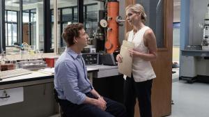 A promotional still from TV series Dexter: Original Sin featuring Patrick Gibson as young Dexter Morgan sitting facing Sarah Michelle Gellar as Tanya Martin.