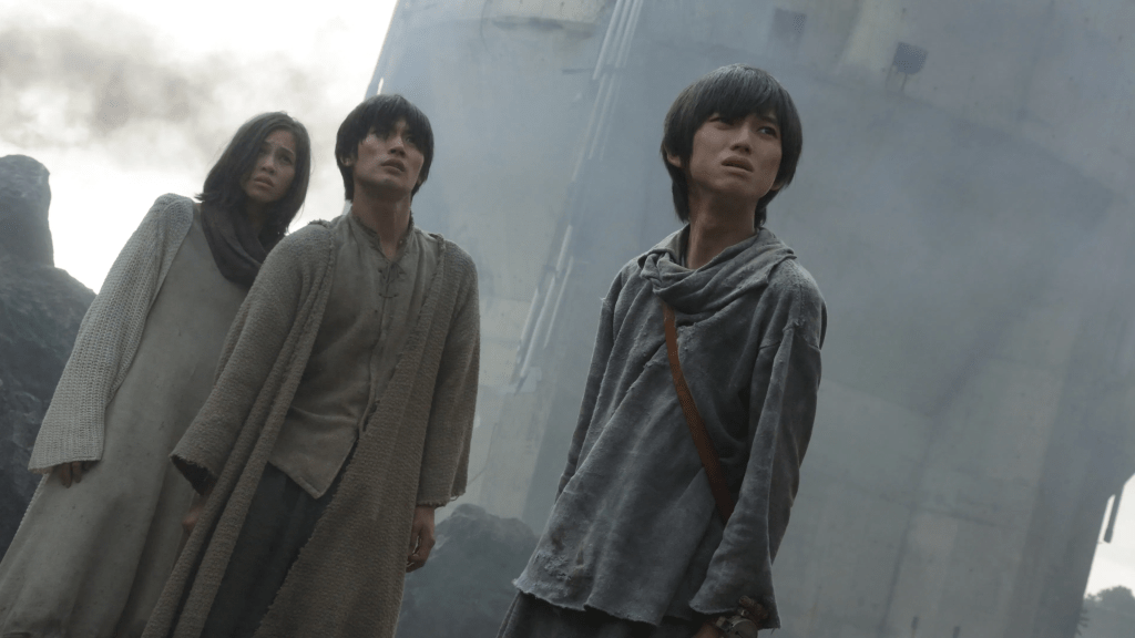Attack on Titan 2015 movie still featuring Kanata Hongô, Haruma Miura, and Kiko Mizuhara