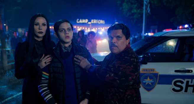 Catherine Zeta-Jones and Luis Guzman comforting Isaac Ordonez in Wednesday Season 2.