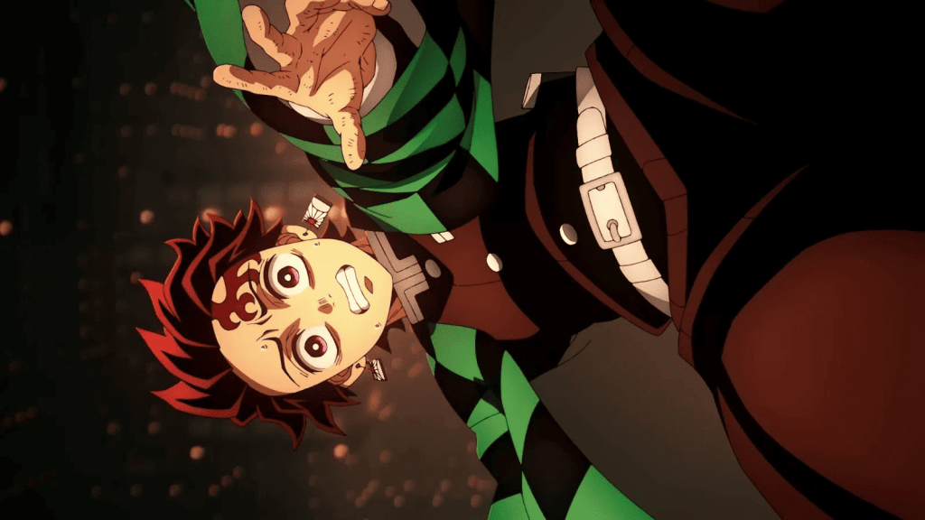Tanjiro Kamado plummeting through the Infinity Castle, reaching out in desperation as the world tilts around him. He's the main protagonist of Demon Slayer: Kimetsu no Yaiba.