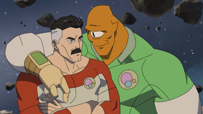 Nolan or Omi-man has Alan's an arm around him, they're in space with asteroids and stars in the background.