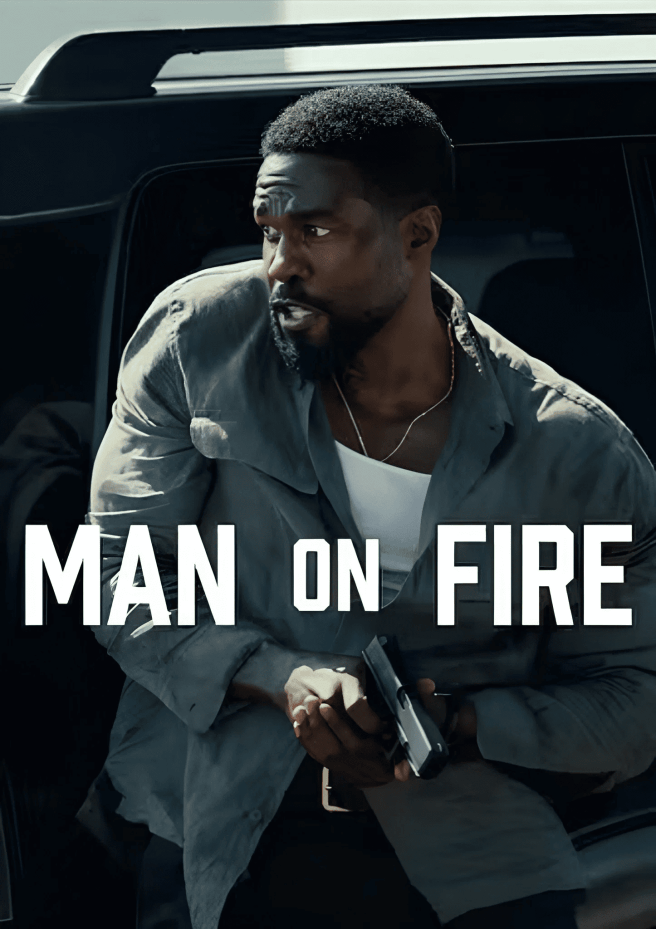 Yahya Abdul Mateen II as John Creasy in a grey shirt and white undershirt holds a handgun in "MAN ON FIRE."