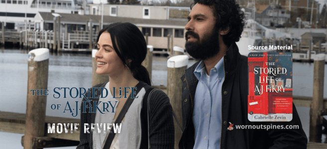Lucy Hale as Amelia and Kunal Nayyar as A.J. Fikry walking around docks.
